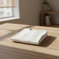 Short sleeve t-shirt folded on wooden surface